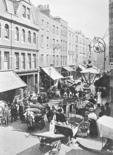 A market in Little Earl Street, looking east, East London. Artist: Unknown