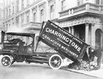 A Charrirngtons lorry unloading coal. Artist: Unknown