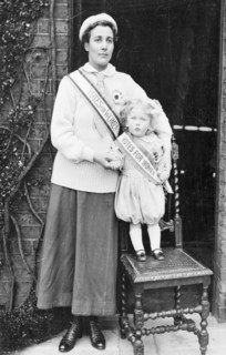 Rose Lamartine Yates wearing the suffragette uniform, with her son Paul, Surrey, c1910. Artist: Unknown