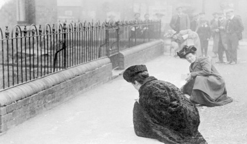 Emma Sproson (left) and a friend chalking the pavement, 1907. Artist: Unknown
