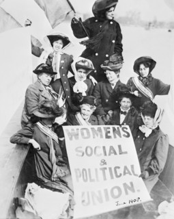 Suffragettes advertising the Women's Social and Political Union, from a boat, June 1908. Artist: Unknown