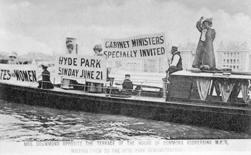 'General' Mrs Drummond in a boat opposite the terrace of the House of Commons, 1908. Artist: Unknown