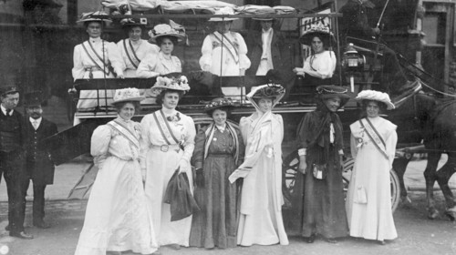 Suffragettes in 'Votes for Women' sashes, c1910. Artist: Unknown