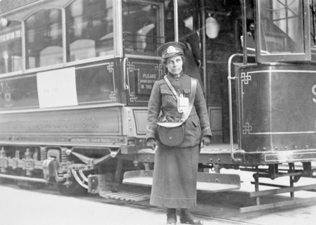 A tram conductor in her winter uniform, possibly in Glasgow, 1915. Artist: Unknown
