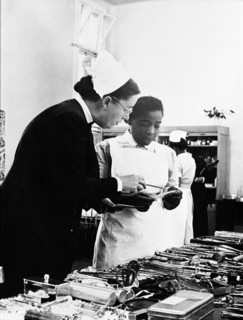 A nurse being trained, 1960. Creator: Henry Grant.