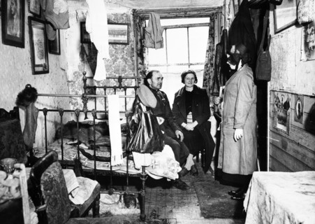 Salvation Army visiting a resident in Notting Hill, London, c1900. Artist: Unknown.