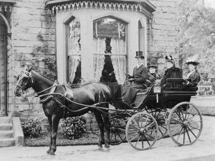 Women and a coachman in a pony and trap, late 19th century. Artist: Unknown