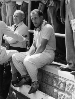 Stirling Moss at the British Grand Prix, Aintree, 1955. Artist: Unknown