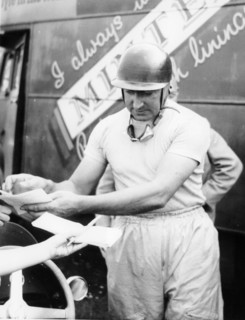 Ken Wharton signing autographs. Artist: Unknown