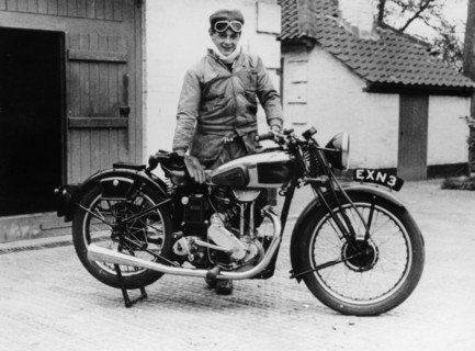 Donald Campbell outside a garage at Headley Grove, Surrey, 1938. Artist: Unknown
