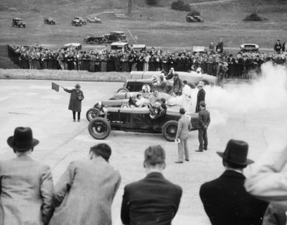 Cars lined up for the start of a race, Brooklands, Surrey, c 1925-c1930. Artist: Unknown