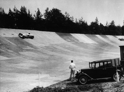 John Cobb's Napier Railton on the banking, Brooklands, Surrey, c1933-c1935. Artist: Unknown