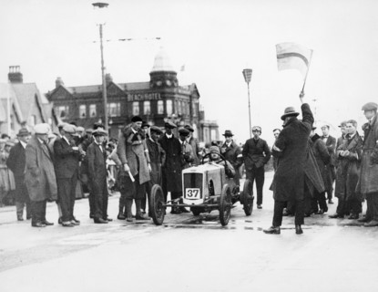 Archie Frazer-Nash waiting at the start of a motor racing event. Artist: Unknown