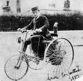 Leon Serpollet on his first steam tricycle, 1887. Artist: Unknown
