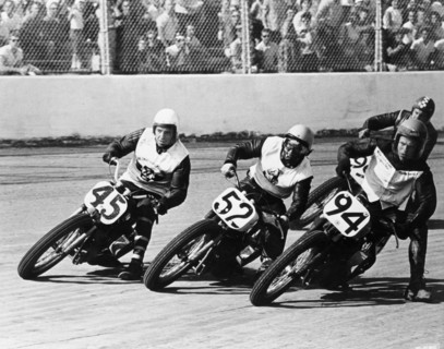 Competitors in a dirt track race, America. Artist: Unknown