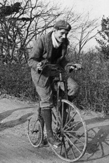 A young Lord Nuffield riding a bicycle down a country lane. Artist: Unknown
