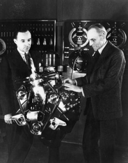 Henry and Edsel Ford with a Ford V8 engine, (c1940s?). Artist: Unknown