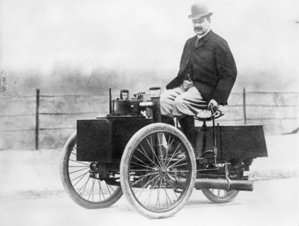 Albert de Dion on a steam tricycle, 1888. Artist: Unknown