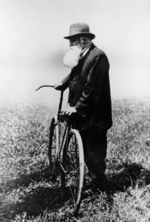 John Boyd Dunlop with bicycle, July 1918. Artist: Unknown