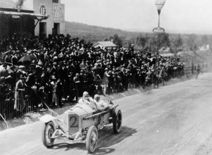 Christian Lautenschlager passing the tribunes, in the Targa Florio race, Sicily, 1922. Artist: Unknown