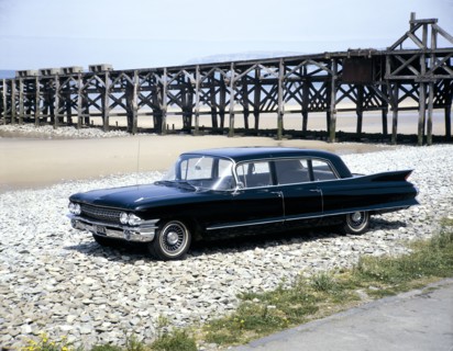 A 1961 Cadillac Presidential limousine on a beach. Artist: Unknown