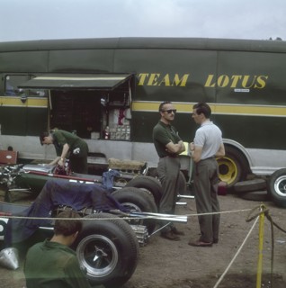 Chapman and Clark outside the Lotus team bus, French Grand Prix, Clermont-Ferrand, France, 1965. Artist: Unknown