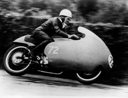 Possibly Bill Lomas, on a Moto Guzzi V8, 1957. Artist: Unknown