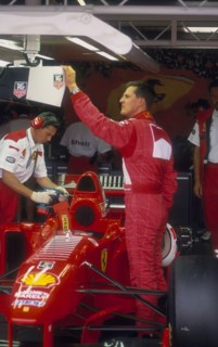 Michael Schumacher with Ferrari, British Grand Prix, Silverstone, Northamptonshire, 1997. Artist: Unknown