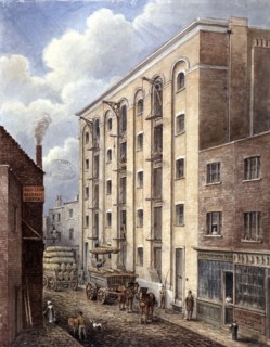 Hay's Wharf with carts being loaded up outside, Bermondsey, London, 1834. Artist: Unknown
