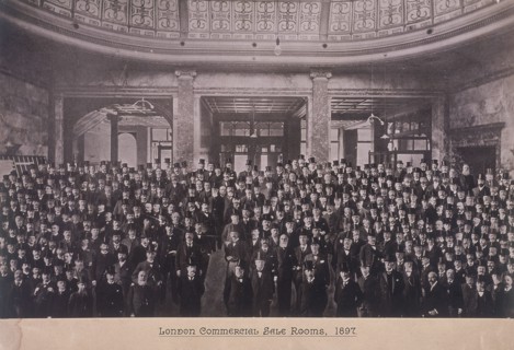 Group portrait of men in the London Commercial Sale Rooms, Mincing Lane, London, 1897. Artist: Anon