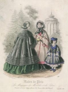 Two women and a child wearing the latest fashions in a garden setting, 1860. Artist: Anon