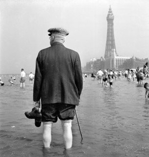 An elderly man paddling in the sea, Blackpool, c1946-c1955