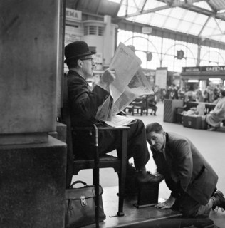 Shoeblack at Waterloo Station, London, 1962-1964