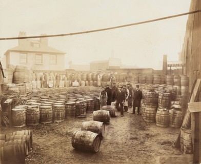 Ebano bitumen stored at Elizabeth Wharf, Limehouse, London, c1900. Artist: Unknown