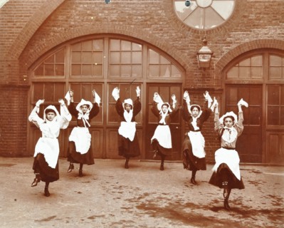 Girls morris dancing in playground, Thomas Street Girls School, Limehouse, Stepney, London, 1908. Artist: Unknown.