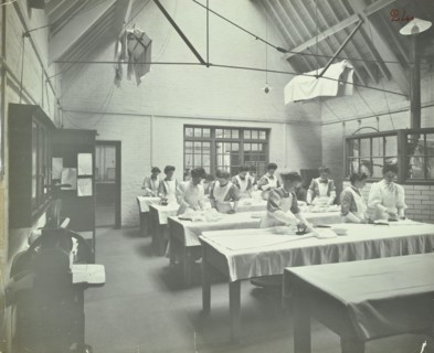 The ironing room, Battersea Polytechnic, London, 1907. Artist: Unknown.