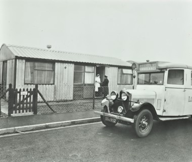 Ambulance delivering a cylinder of gas, Woolwich, London, 1946. Artist: Unknown.