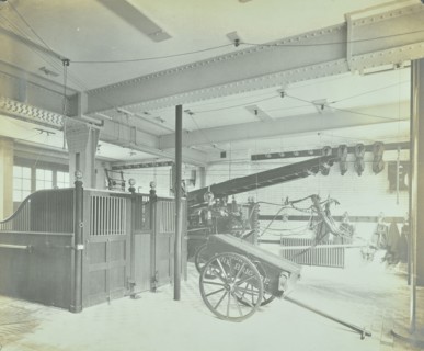 Interior of appliance room, Northcote Road Fire Station, Battersea, London, 1906. Artist: Unknown.