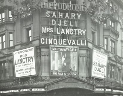 Illuminated advertisements on the front of The Hippodrome, Charing Cross Road, London, 1911. Artist: Unknown.