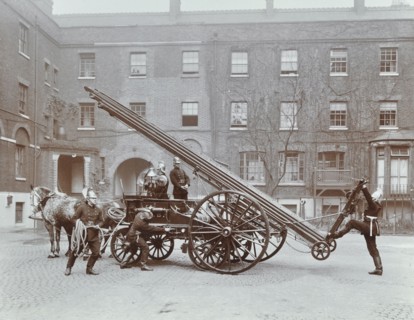 Firemen demonstrating a horse-drawm escape vehicle, London Fire Brigade Headquarters, London, 1910. Artist: Unknown.