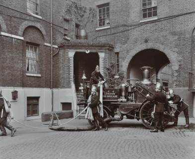 Firemen demonstrating motor steamer hoses, London Fire Brigade Headquarters, London, 1910. Artist: Unknown.