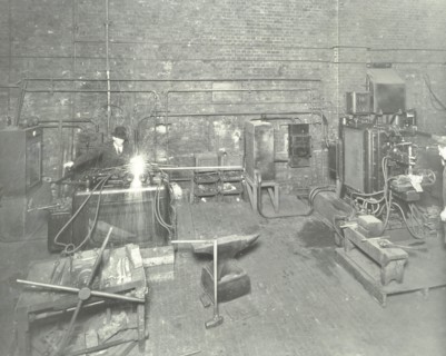 Men welding, Charlton Central Repair Depot, London, 1932. Artist: Unknown.