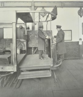 Learner-driver under instruction in a mock-up of tram car cab, London, 1932. Artist: Unknown.