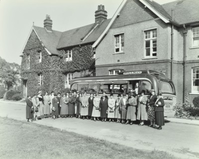 Group of women visitors in front of a school, Croydon, 1937. Artist: Unknown.