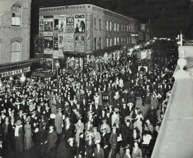 Crowds of shoppers in Rye Lane at night, Peckham, London, 1913. Artist: Unknown.