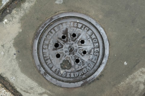 Coal hole plate outside 48 Arbour Square, Stepney, Tower Hamlets, London, 2010