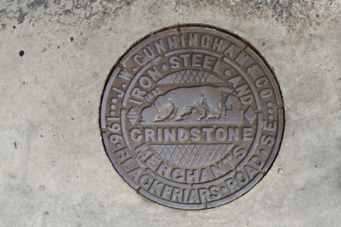 Coal hole plate made by JW Cunningham & Co, Lower Marsh, Lambeth, London, 2010