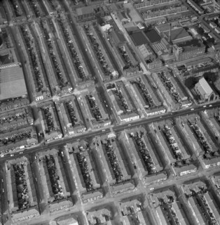 Aerial view of terraced houses, a mill and a church, Preston, Lancashire, 1971