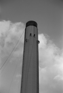Workers painting an industrial chimney, Hackney, London, 1965
