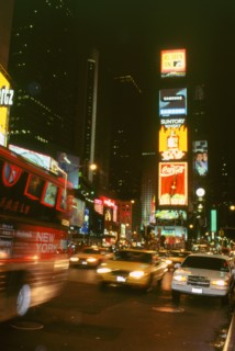 New York city street at night. Artist: Unknown.
